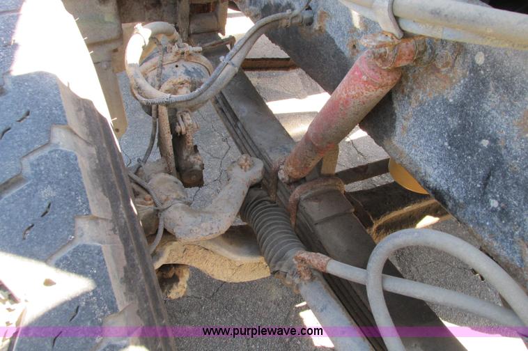 image for item E5138 2000 Peterbilt 378 quad axle dump truck