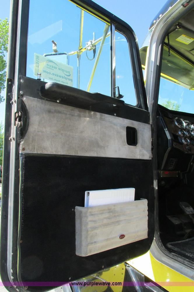 image for item E5138 2000 Peterbilt 378 quad axle dump truck