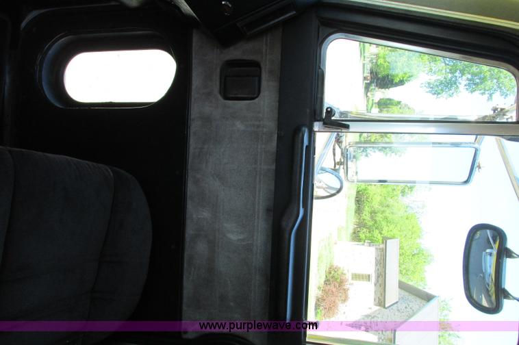 image for item E5138 2000 Peterbilt 378 quad axle dump truck