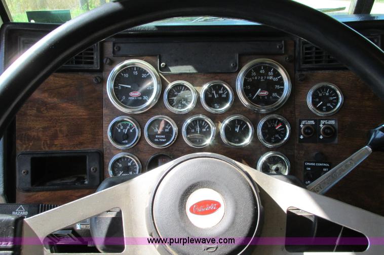 image for item E5138 2000 Peterbilt 378 quad axle dump truck