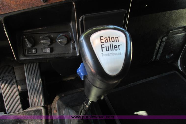 image for item E5138 2000 Peterbilt 378 quad axle dump truck