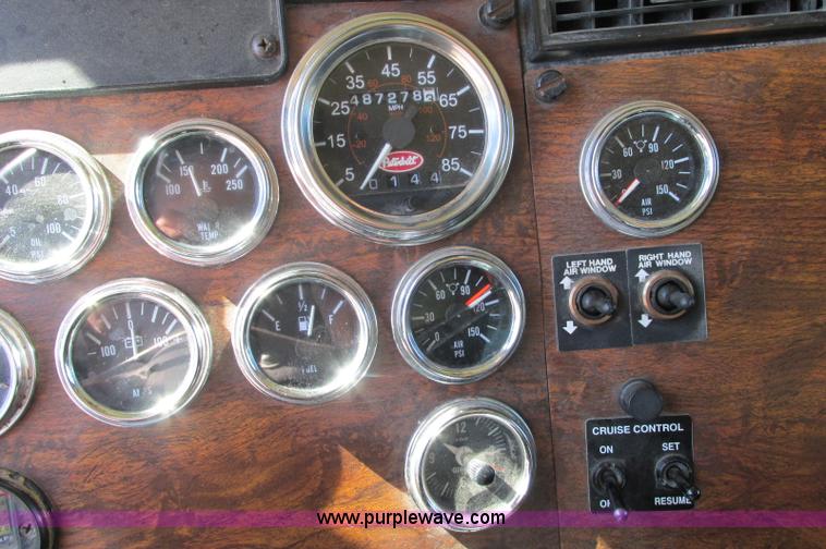 image for item E5138 2000 Peterbilt 378 quad axle dump truck