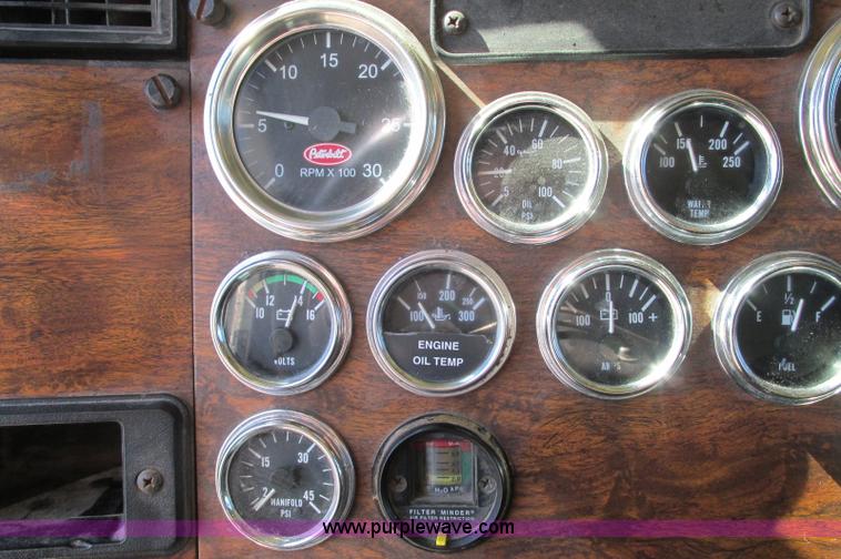 image for item E5138 2000 Peterbilt 378 quad axle dump truck