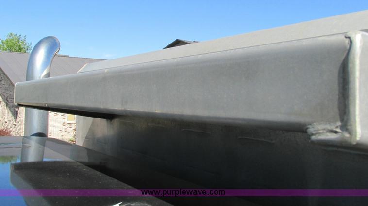 image for item E5138 2000 Peterbilt 378 quad axle dump truck