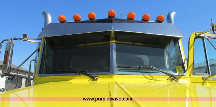 image for item E5138 2000 Peterbilt 378 quad axle dump truck