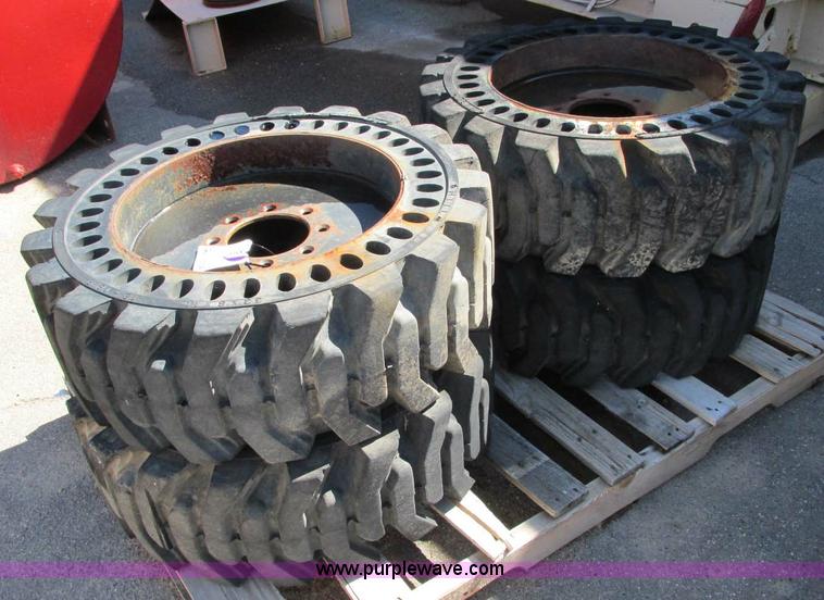 image for item E5154 (4) solid skid steer tires