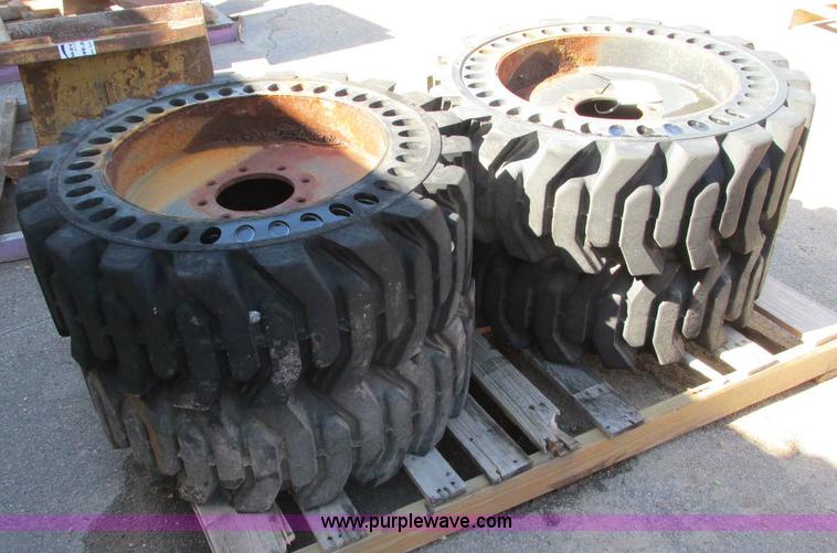 image for item E5154 (4) solid skid steer tires