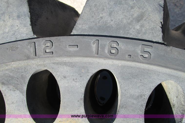 image for item E5154 (4) solid skid steer tires