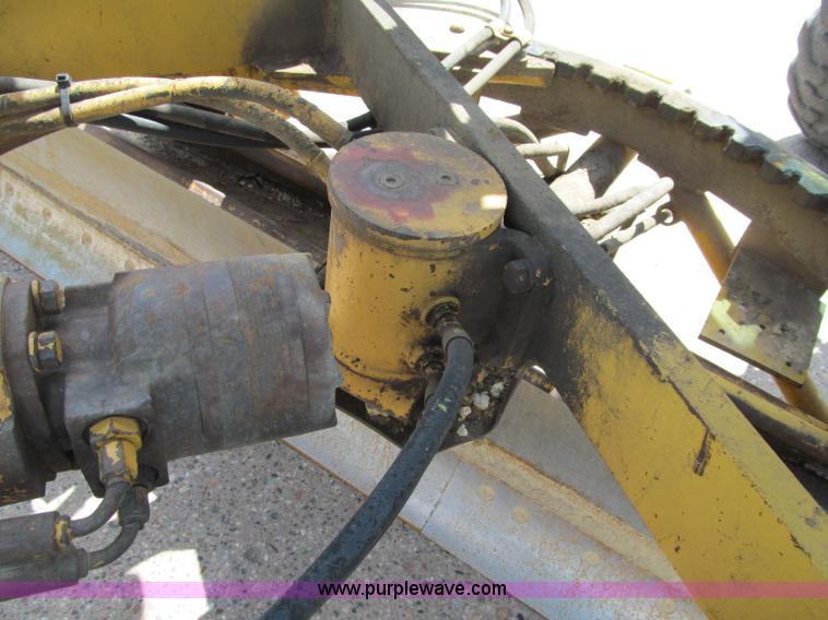image for item F8585 1977 Caterpillar 120G articulated motor grader