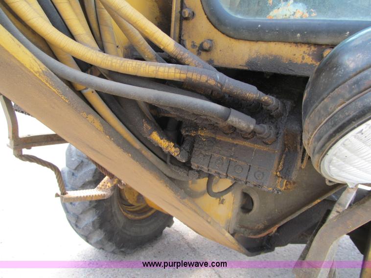 image for item F8585 1977 Caterpillar 120G articulated motor grader