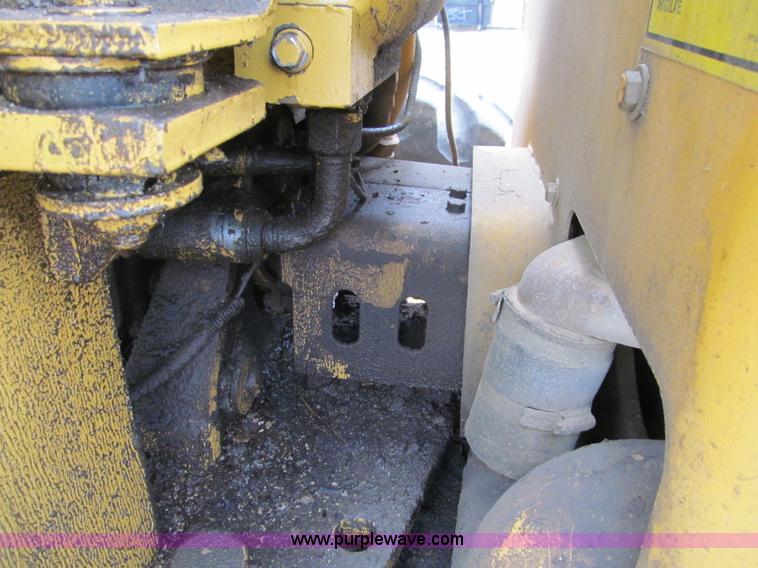 image for item F8585 1977 Caterpillar 120G articulated motor grader