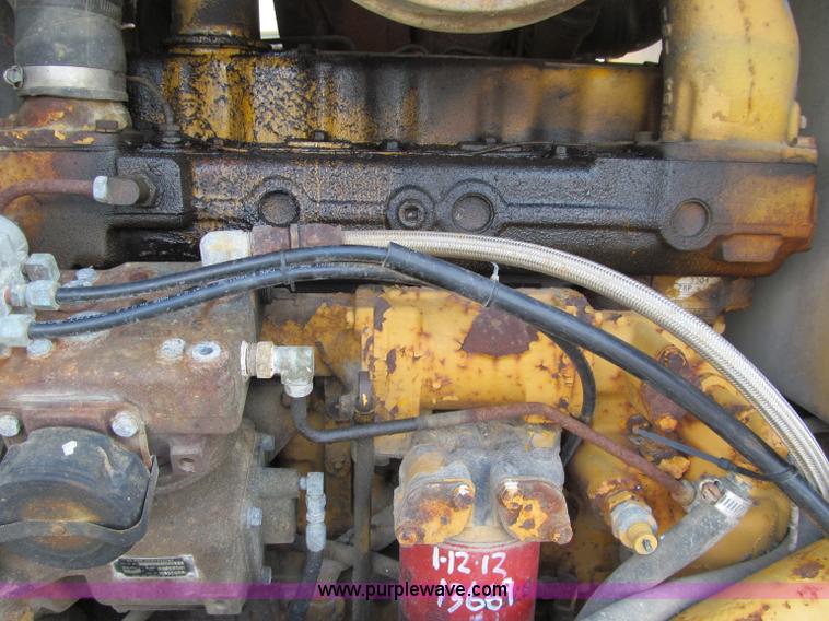 image for item F8585 1977 Caterpillar 120G articulated motor grader