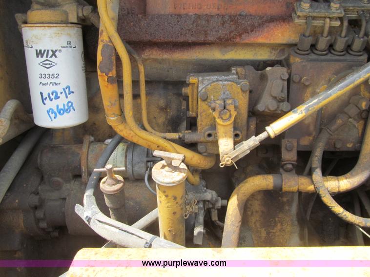 image for item F8585 1977 Caterpillar 120G articulated motor grader