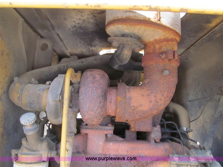 image for item F8585 1977 Caterpillar 120G articulated motor grader