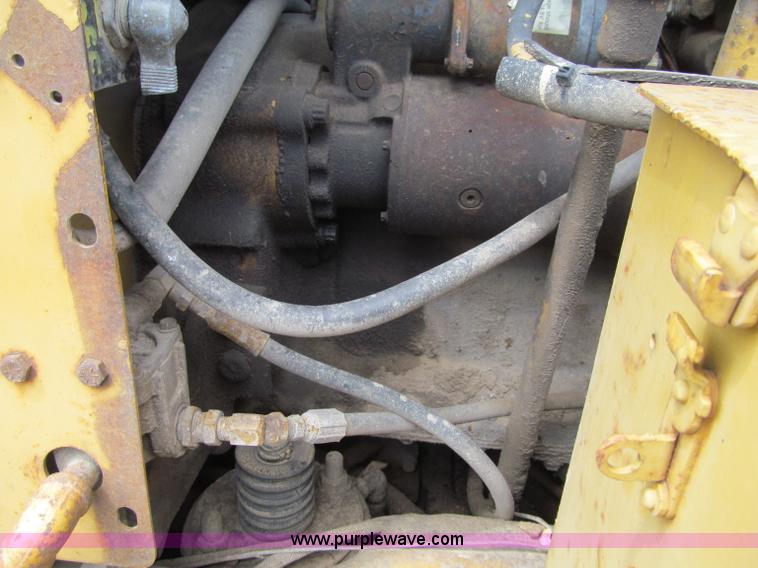 image for item F8585 1977 Caterpillar 120G articulated motor grader