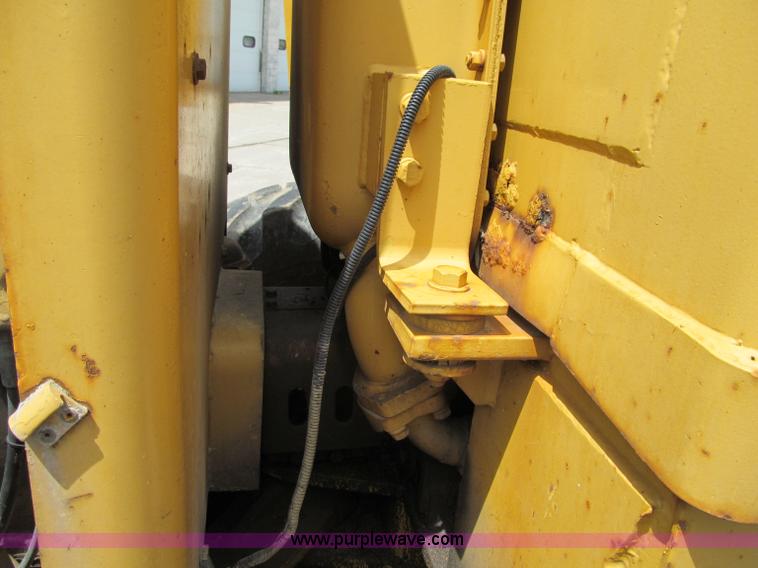 image for item F8585 1977 Caterpillar 120G articulated motor grader