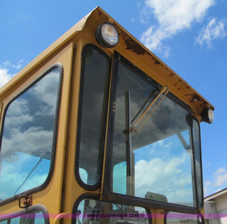 image for item F8585 1977 Caterpillar 120G articulated motor grader