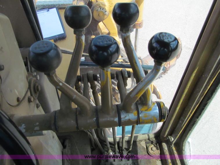 image for item F8585 1977 Caterpillar 120G articulated motor grader