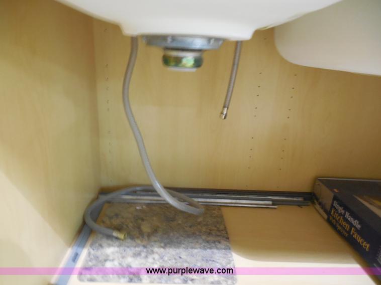 image for item H3137 Kemper cherry cabinet with sink