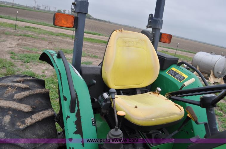 image for item G6030 1999 John Deere 5310 MFWD tractor