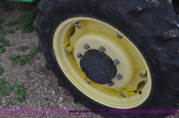 image for item G6030 1999 John Deere 5310 MFWD tractor