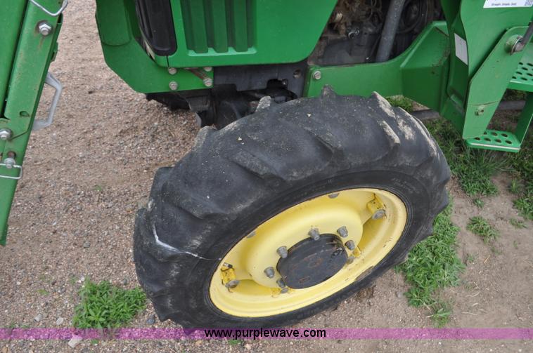image for item G6030 1999 John Deere 5310 MFWD tractor