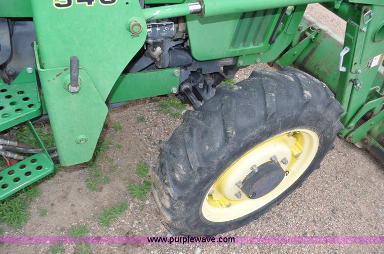 image for item G6030 1999 John Deere 5310 MFWD tractor
