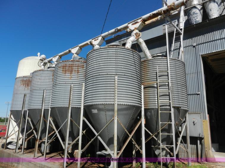 image for item H3084 (9) bulk grain storage bins with augers