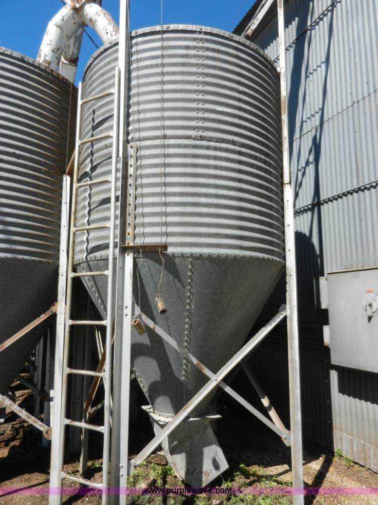 image for item H3084 (9) bulk grain storage bins with augers