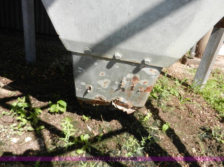 image for item H3084 (9) bulk grain storage bins with augers