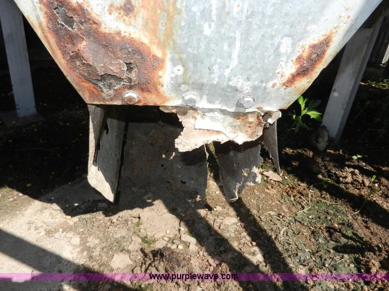 image for item H3084 (9) bulk grain storage bins with augers