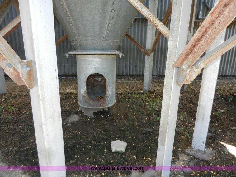 image for item H3084 (9) bulk grain storage bins with augers