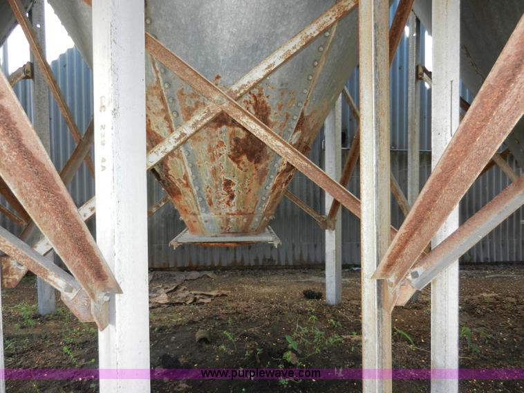 image for item H3084 (9) bulk grain storage bins with augers