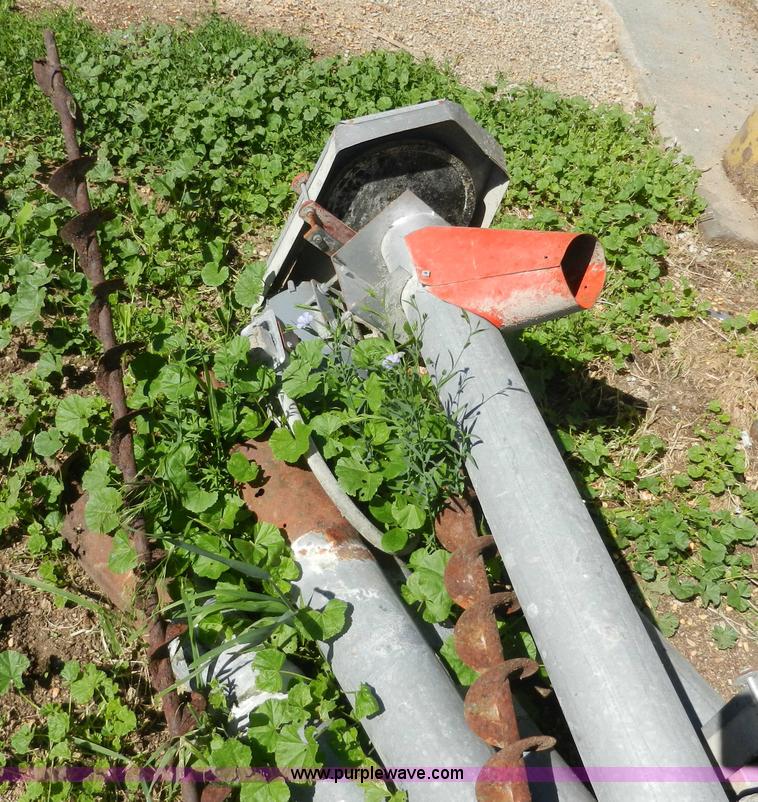 image for item H3084 (9) bulk grain storage bins with augers
