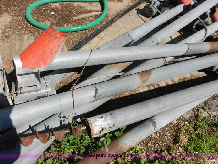 image for item H3084 (9) bulk grain storage bins with augers