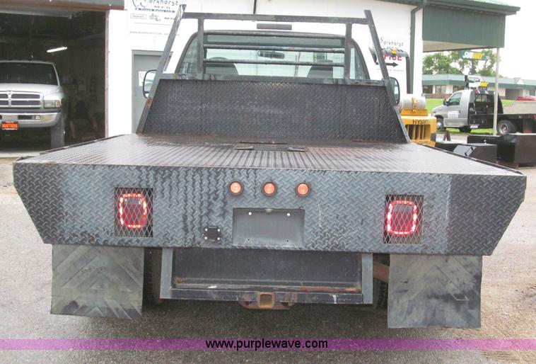 image for item B5492 2004 Ford F350  XL Super Duty flatbed truck