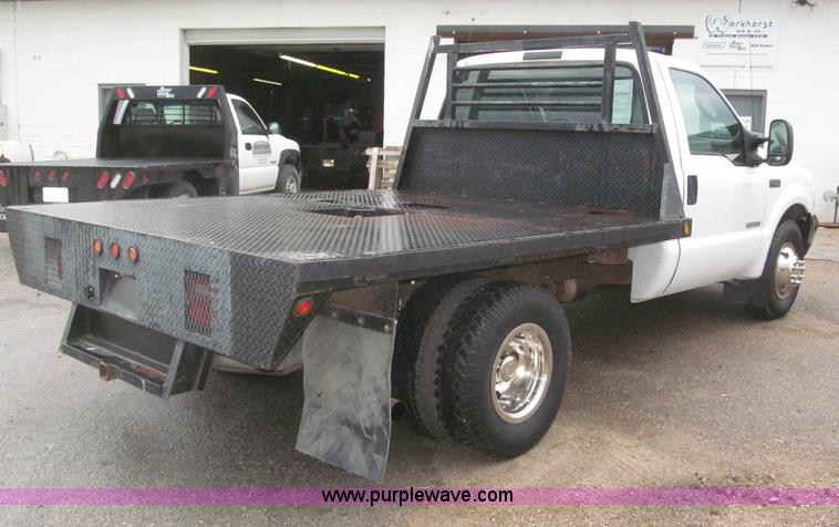 image for item B5492 2004 Ford F350  XL Super Duty flatbed truck