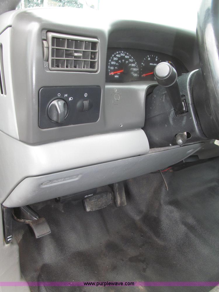 image for item B5492 2004 Ford F350  XL Super Duty flatbed truck