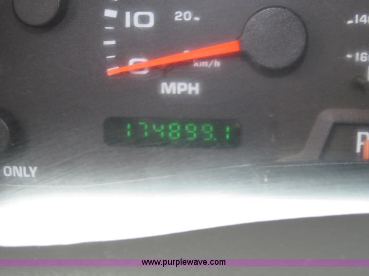 image for item B5492 2004 Ford F350  XL Super Duty flatbed truck