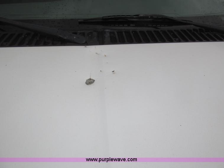 image for item B5492 2004 Ford F350  XL Super Duty flatbed truck