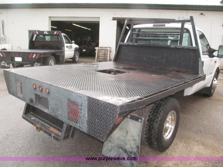 image for item B5492 2004 Ford F350  XL Super Duty flatbed truck