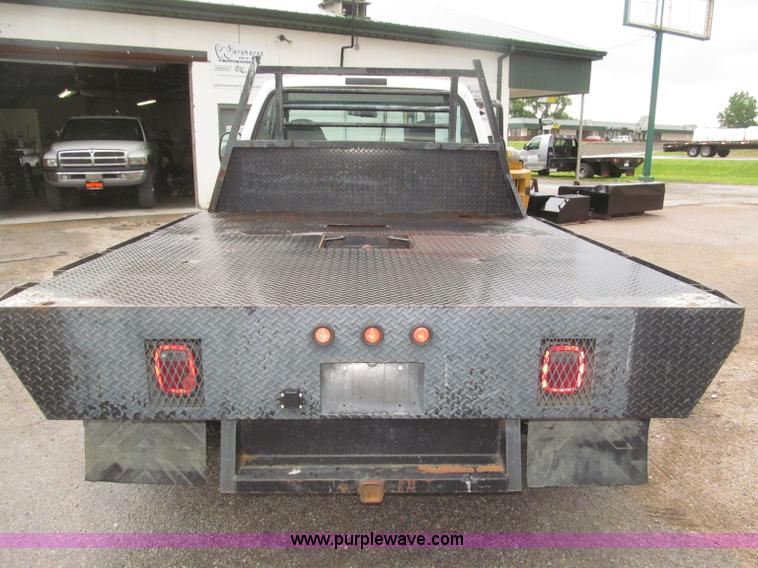 image for item B5492 2004 Ford F350  XL Super Duty flatbed truck