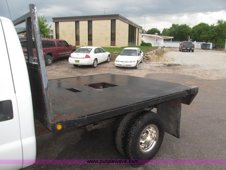 image for item B5492 2004 Ford F350  XL Super Duty flatbed truck