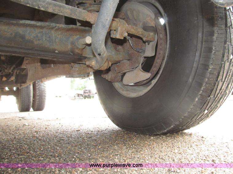 image for item B5492 2004 Ford F350  XL Super Duty flatbed truck