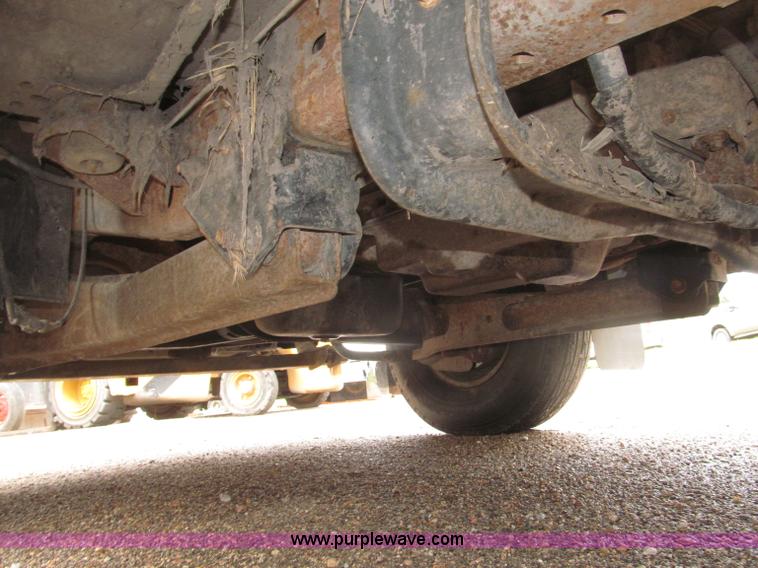 image for item B5492 2004 Ford F350  XL Super Duty flatbed truck