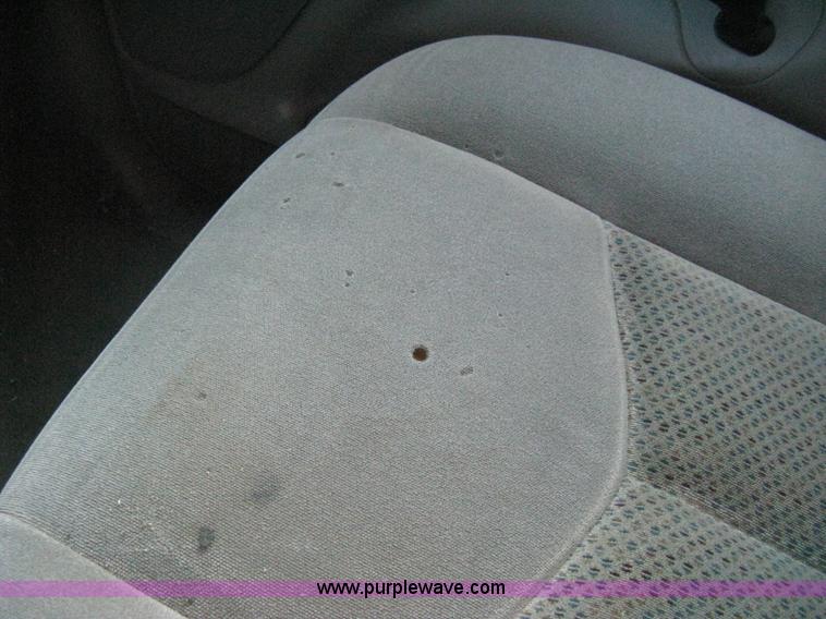 image for item D8332 2004 Chevrolet Silverado 1500 Extended Cab pickup truck