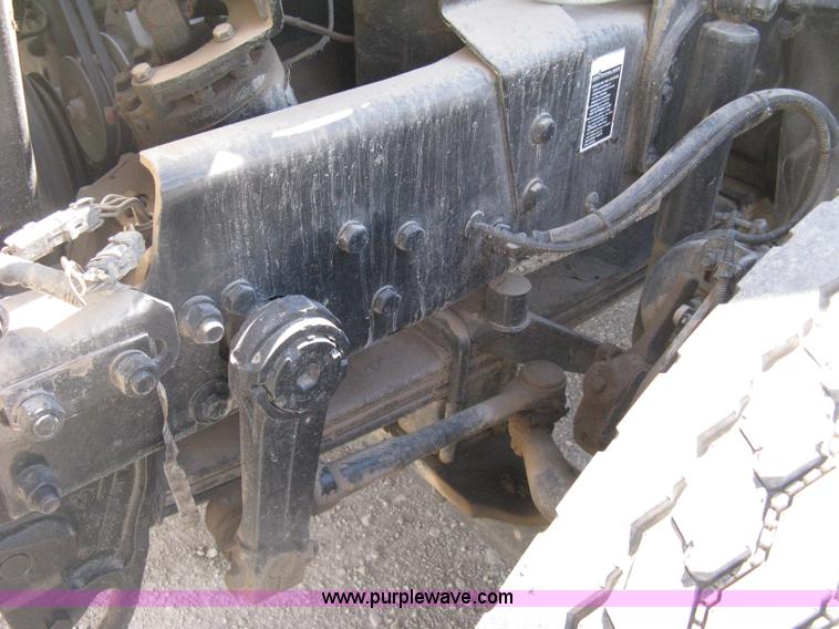 image for item D8363 2002 Mack RD688S roll-off truck