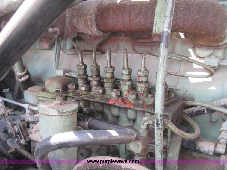 image for item D8363 2002 Mack RD688S roll-off truck