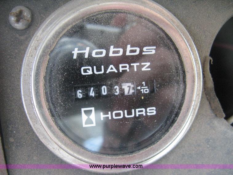 image for item D8363 2002 Mack RD688S roll-off truck