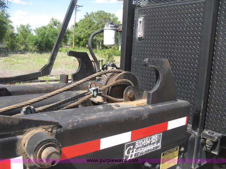 image for item D8363 2002 Mack RD688S roll-off truck